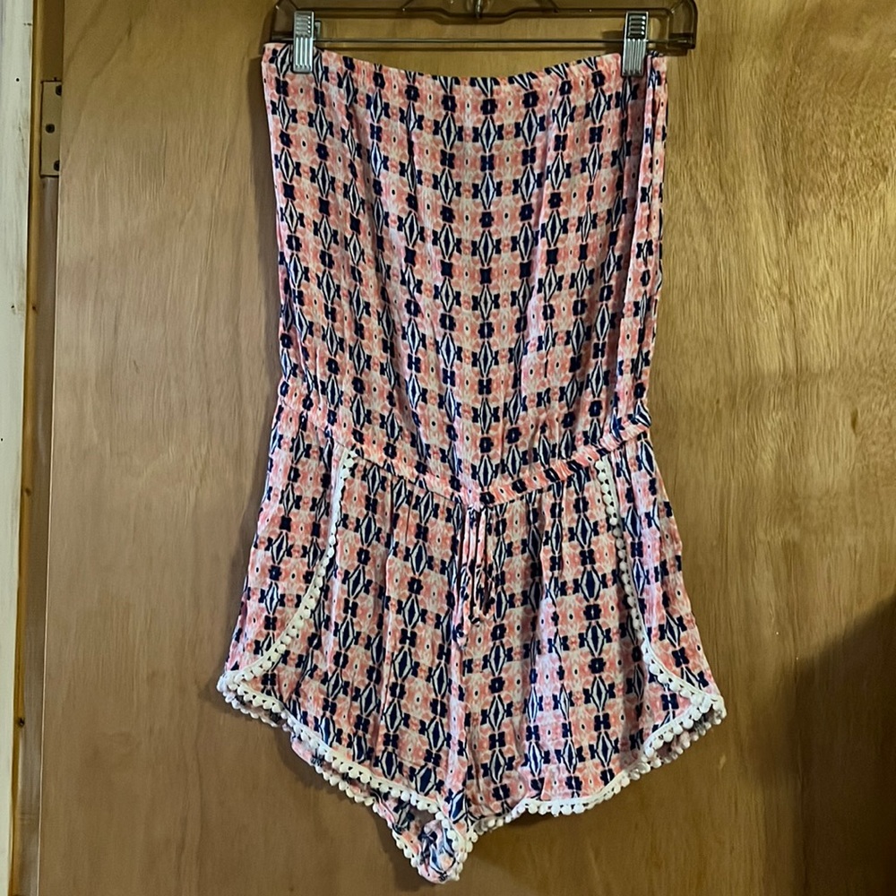 Timing medium pink and blue romper with white balls for detail